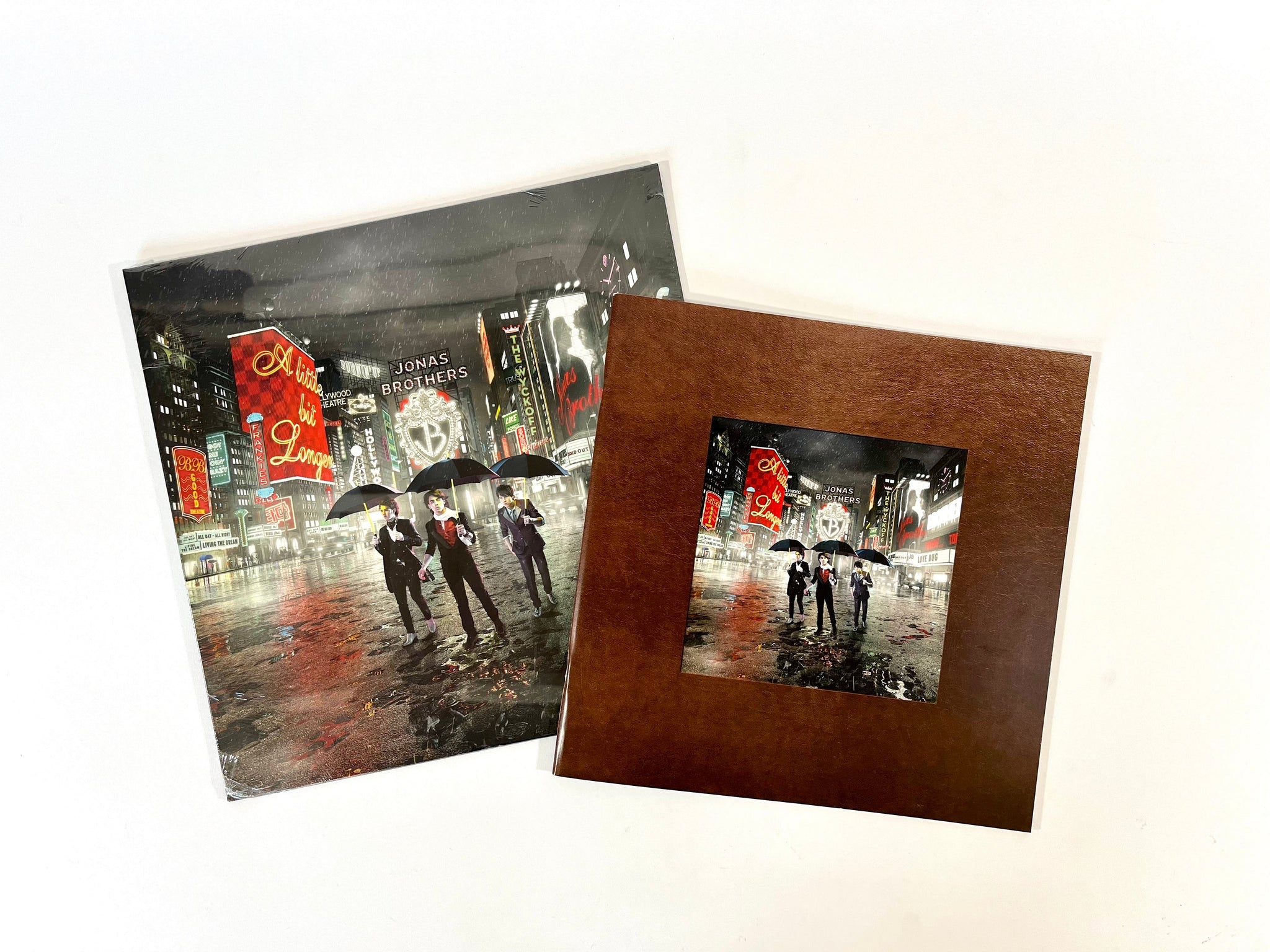 BUNDLE!  Jonas Brothers - "A Little Bit Longer" LP (in Red vinyl) + Photobook