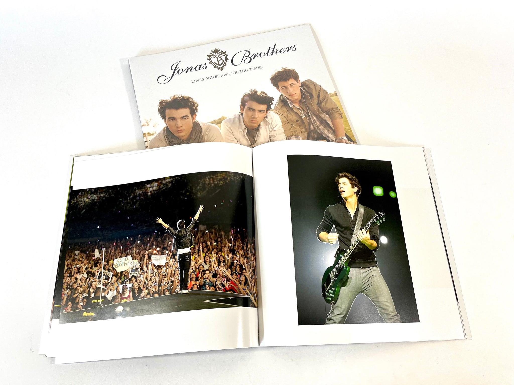 BUNDLE!  Jonas Brothers - "Lines, Vines & Trying Times" LP (in Classic Black vinyl) + Photobook